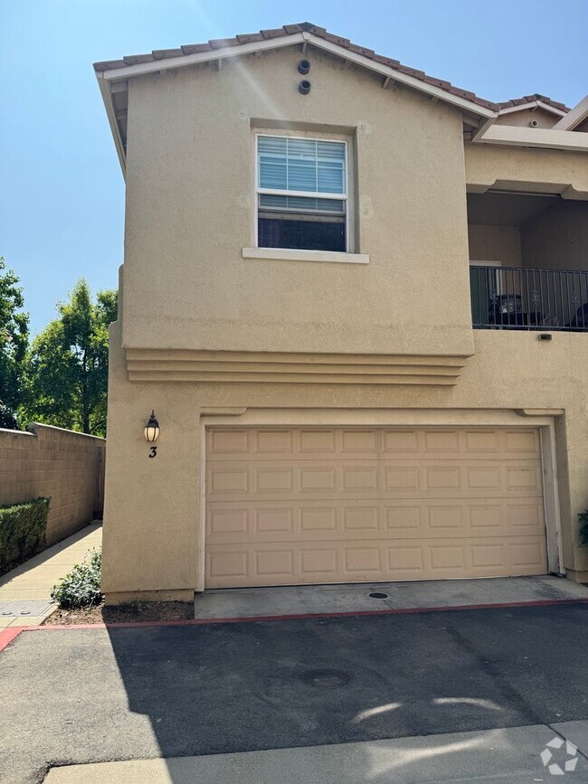 Building Photo - Condo with new paint and carpet! Access to...