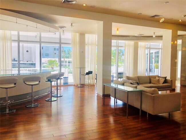 Building Photo - 10275 Collins Ave