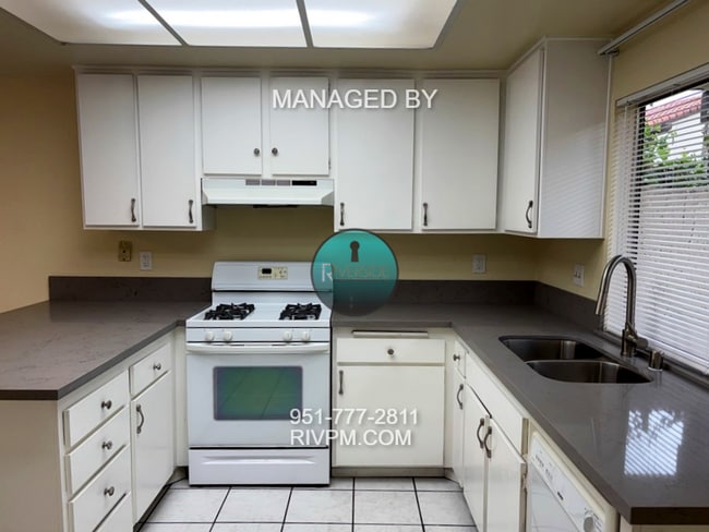 Building Photo - DISCOVER YOUR DREAM CONDO IN COLTON!!!