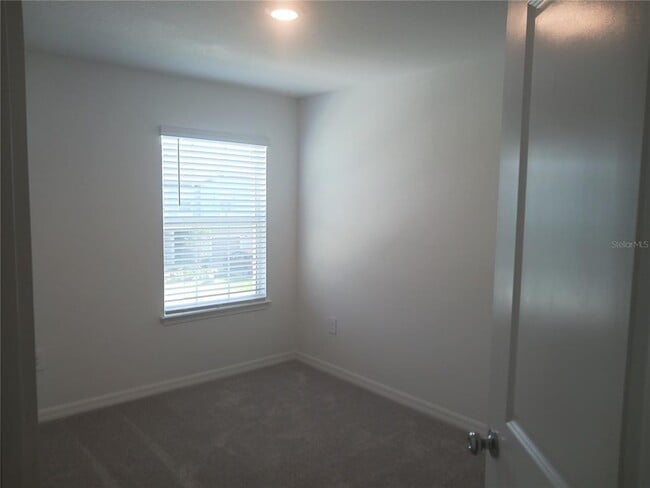 Building Photo - 8607 Tropical Aire Ln