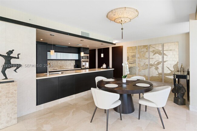 Building Photo - 5875 Collins Ave