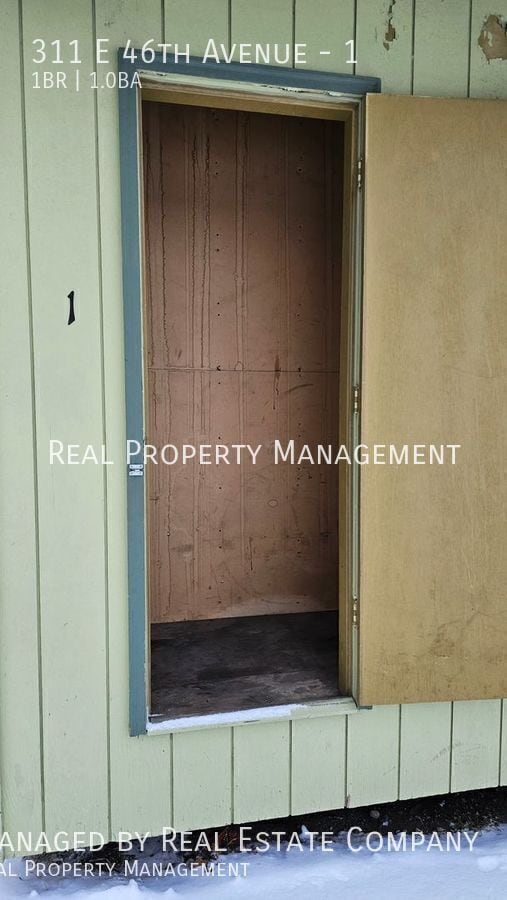 Building Photo - 311 E 46th Ave