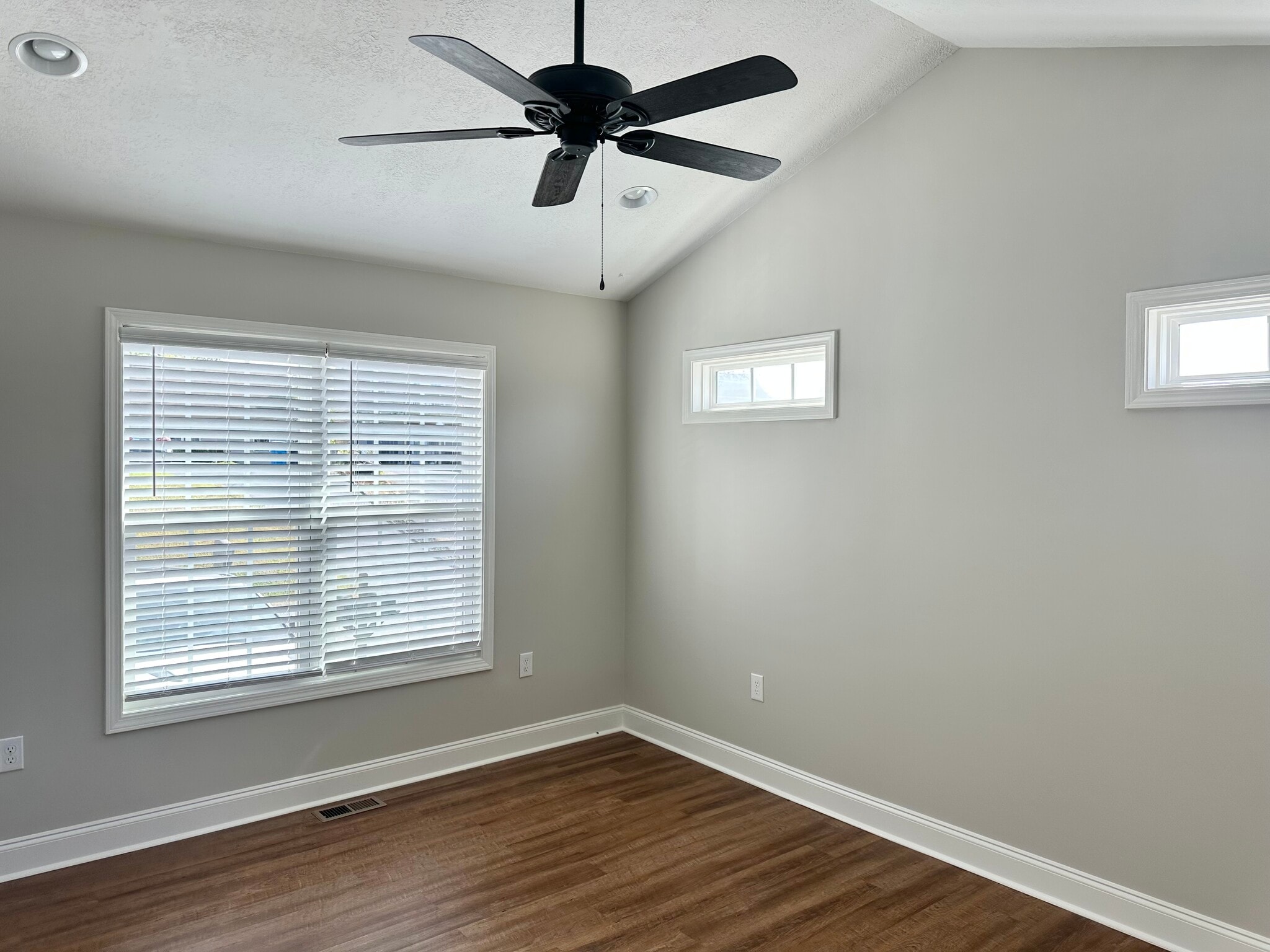 Vaulted family room, double window, transoms, ceiling fan, dimmable lighting - 2312-A Belle Ave NE