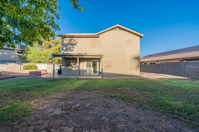 Building Photo - Spacious 5-Bedroom Home with Open Layout & Private Backyard