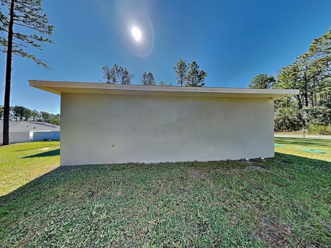 Building Photo - 7669 N Paris Dr