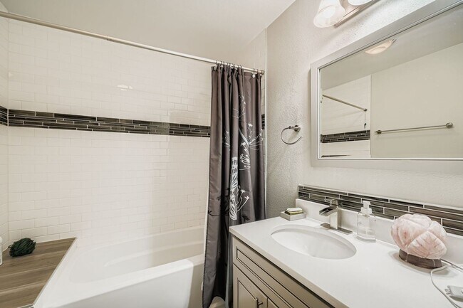 Building Photo - LOCATION, LOCATION! Featuring modern finishes and a peaceful outdoor retreat, this 2-bed 2.5-bath...