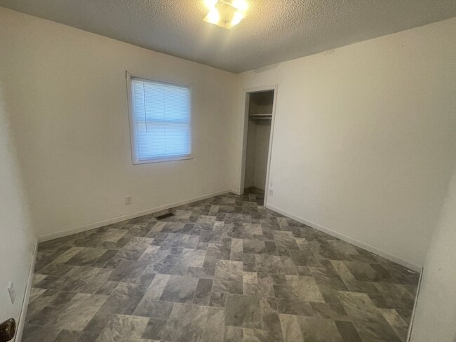 Building Photo - Brick Ranch- Dunn- 4 bedroom 2.5 bath- 2 car carport- Corner Lot