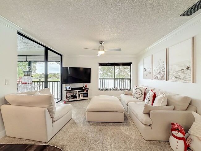 Building Photo - Gorgeous 3 bedroom Corner Unit with Lake view in Coconut Creek