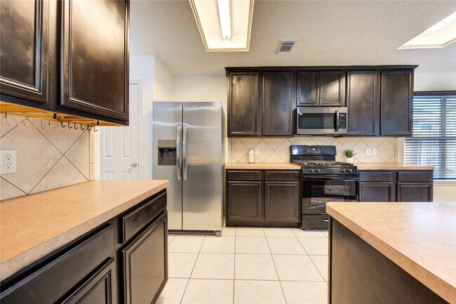 Building Photo - 5010 Moss Garden Ln