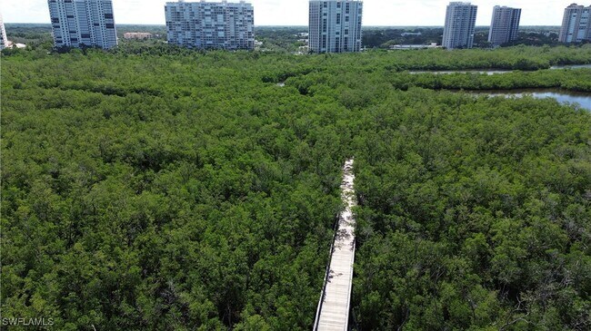 Building Photo - 7048 Pelican Bay Blvd