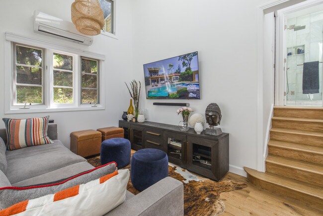 Living room and stairs to bed/bath/kitchen - 6122 Glen Tower St