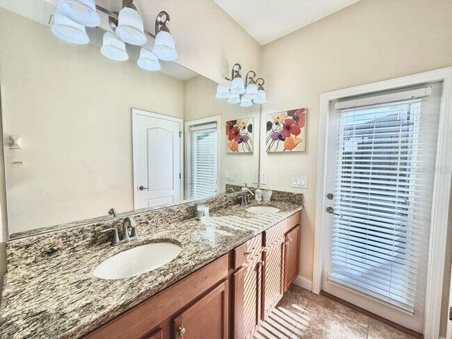 Building Photo - 8894 Candy Palm Rd