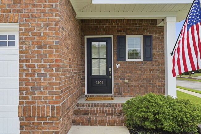 Building Photo - Now available, freshly painted with a community pool!