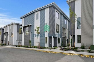 Building Photo - Brand-New 2026 Townhome | 3 Bed | 2.5 Bath | 1,560 Sq Ft | EV Garage | A/C Included