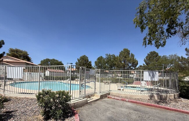Building Photo - TWO BEDROOM TOWNHOME IN THE LAKES WITH GARAGE AND ATTACHED CARPORT