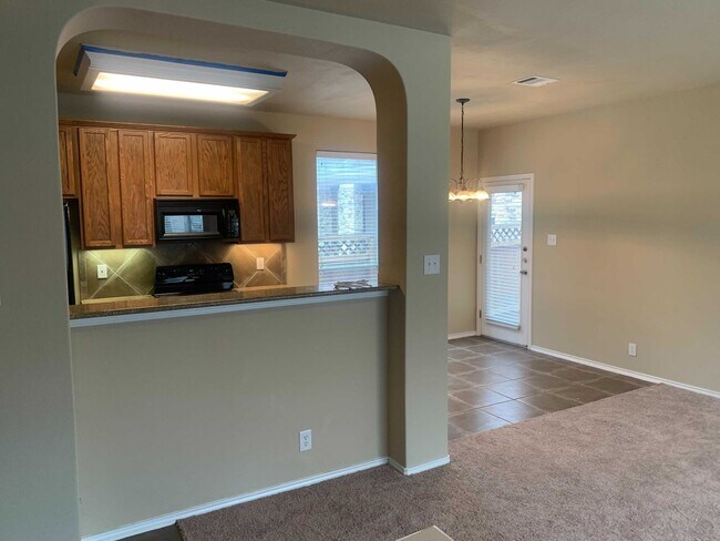 Building Photo - *COMING SOON* Gated Community: 3-Bedroom with Upstairs Loft, Fenced Backyard & Prime Location!