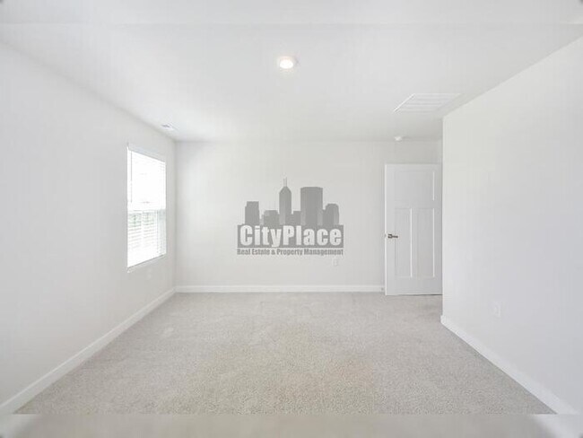 Building Photo - 7009 E Bean Blossom Dr