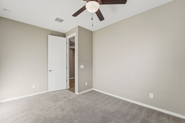 Building Photo - Stunning 4-Bed + Den Eastmark Home with Modern Upgrades Throughout