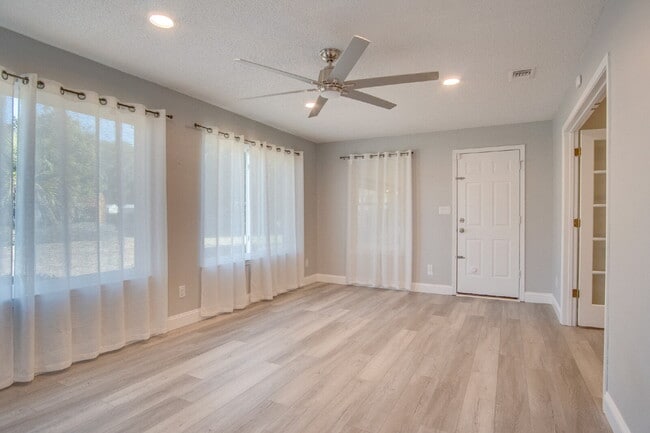 Building Photo - Lakefront 3BR/2BA Home on Orion Lake with Florida Room, Screened Patio, Hot Tub (As-Is), Solar Pa...