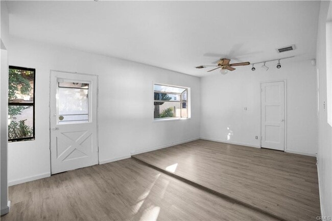 Building Photo - Tucked away behind gorgeous grand gates is this beautifully updated 3 bedroom 2 bath home