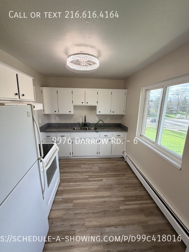 Building Photo - 9976 Darrow Rd