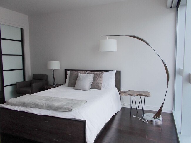 Building Photo - Experience elevated high-rise living at The Martin.