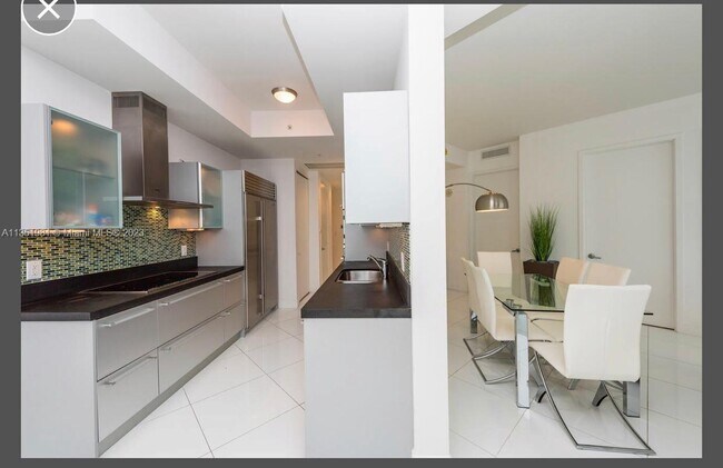 Building Photo - 18201 Collins Ave