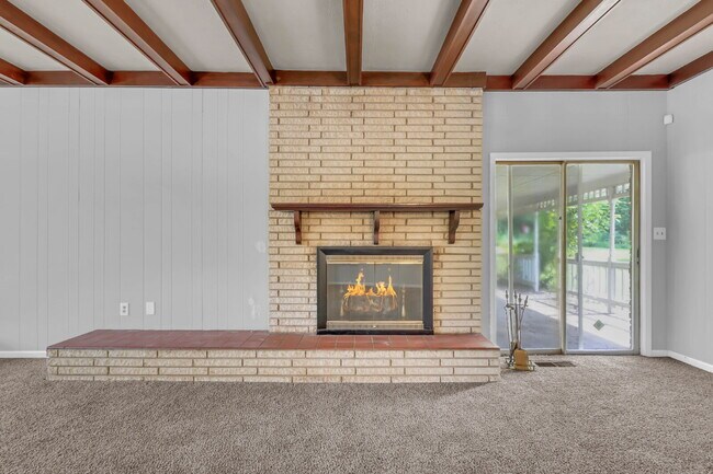Building Photo - spacious 4-bedroom, 2.5-bath home featuring a 2-car garage and fresh updates throughout.