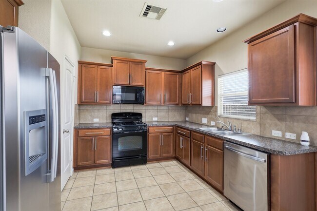 Building Photo - 8911 Headstall Dr