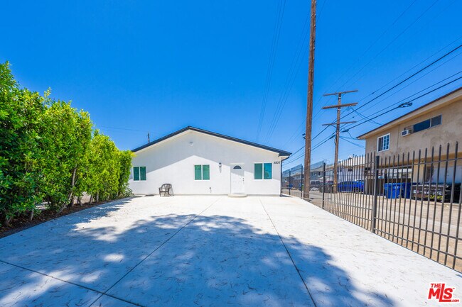 Building Photo - 5837 Cartwright Ave