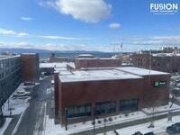 Building Photo - STUNNING LAKE VIEWS - Modern 2BR/2BA Corner Unit in The Vermont House