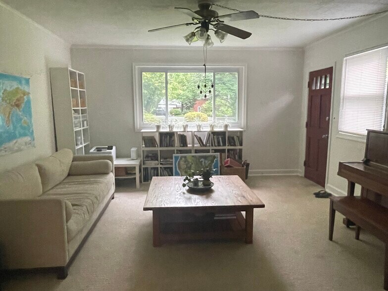 Spacious family room addition leads to deck. Great lush views of yard and trees. - 9707 Bristol Ave