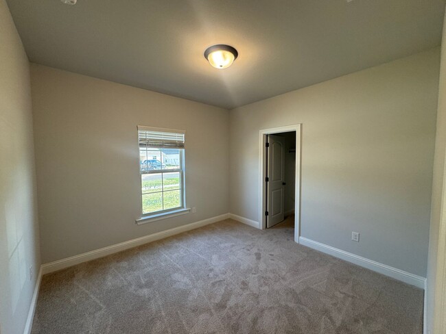 Building Photo - Brand New Construction... Just minutes to ...