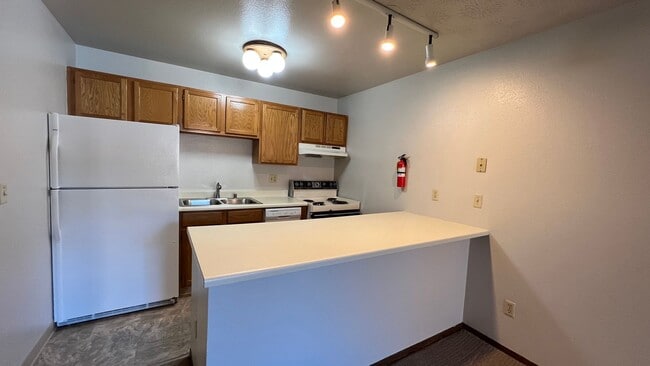 Building Photo - 1 Bedroom Condo in Independence Park w/Garage and Washer/Dryer! Call Today!