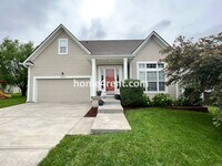 Building Photo - Updated Kitchen w/ Granite Counters, SS Appliances, Finished Basement and a Fenced Yard!