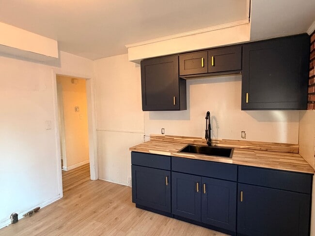 Building Photo - Section 8 welcomed at this modern rehabbed...