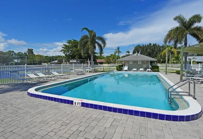 Building Photo - Boater's Dream: 4/2.5/3CG home in exclusiv...