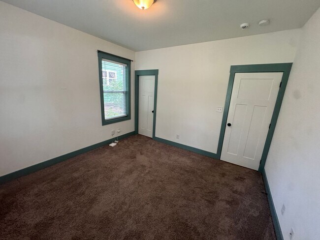 Building Photo - Modern Bungalow Charm: Designer Finishes & Expansive Backyard Living!
