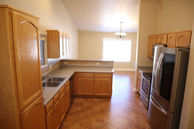 Building Photo - Home With A Pool and Much More!