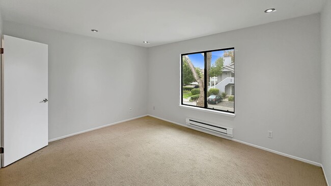 Building Photo - Waterfront Top-Floor West-Facing Apartment...