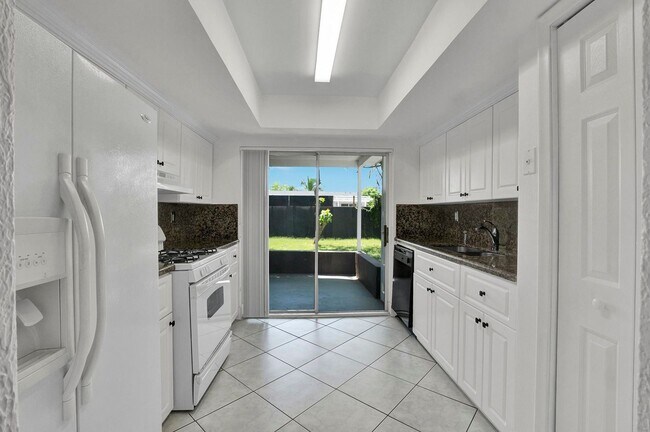 Building Photo - Sunrise Gem: Updated 2-Bed, 2-Bath with Garage Parking