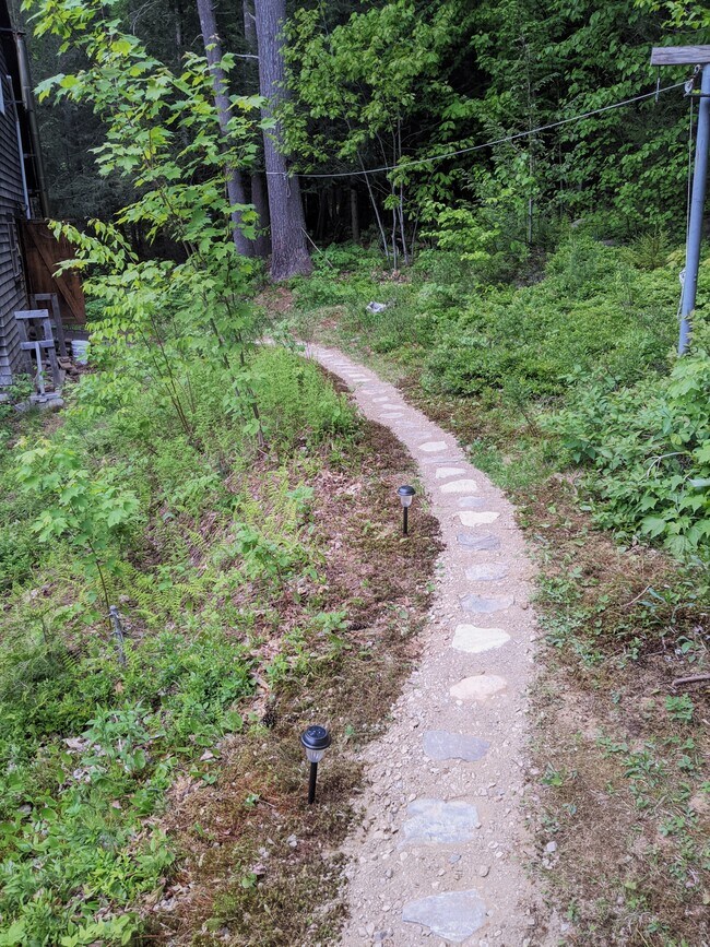 Path behind the house to your unit - 490 Cross Point Rd