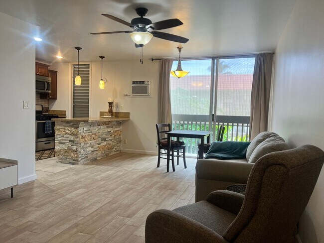 Building Photo - One bedroom semi-furnished bottom floor condo