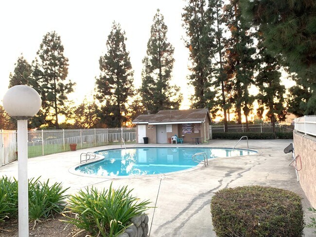 Building Photo - 2-Bedroom, 2-Bath Upstairs Condo Unit in Gated Pomona Community, Water/Trash/HOA Included!