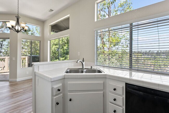 Building Photo - Move-In Special - 50% Off First Month’s Rent! Beautiful End Unit Condo with Overlook of Park and ...