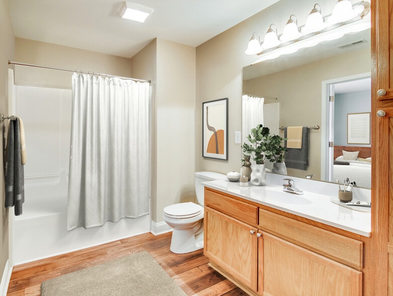 Experience luxury and comfort in this beautifully finished bathroom. - West Pointe