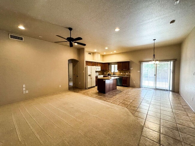 Building Photo - "3-Bed, 2-Bath Retreat in Estrella, Mesa Del Sol!"