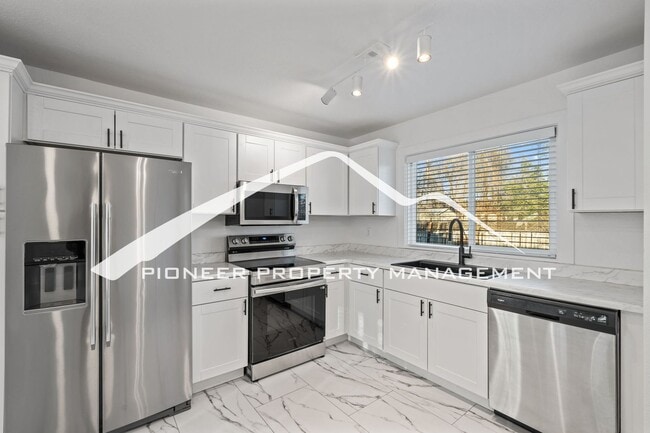 Building Photo - Stylishly Renovated Home with Enclosed Fence, AC and 1 Car Garage