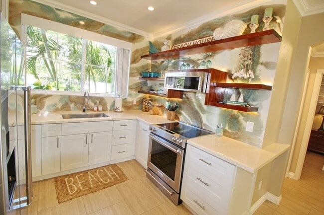 Building Photo - Beach Style 2 bed/2bath Luxury Condo - Finely Furnished - Steps from the Beach - Resort Amenities -