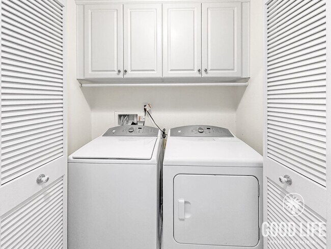 Building Photo - Elegant 3BR Residence in Exclusive Gated Community w/ AC & Garage!